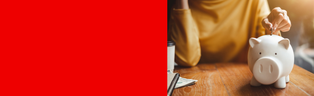 Woman putting money in a piggy bank
